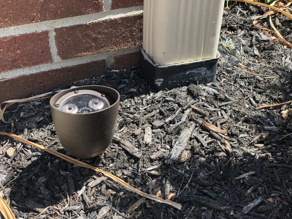 burieddownspoutfishersin A Classic Cut Lawn & Landscape